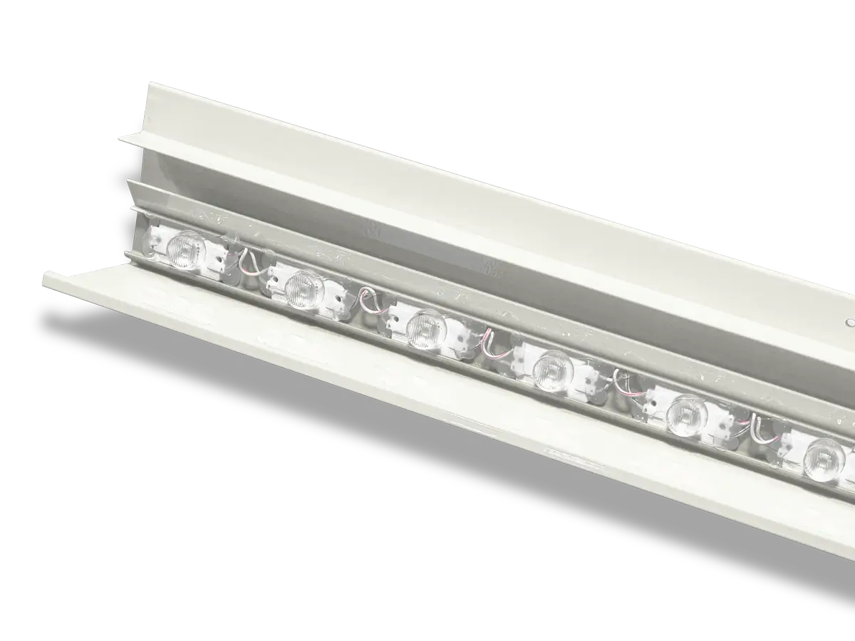 IllumiWrap LED modules installed inside a white metal lighting profile.