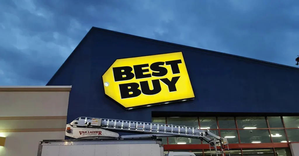Illuminated Best Buy storefront sign featured in a Principal Sloan article about energy-efficient illumination.