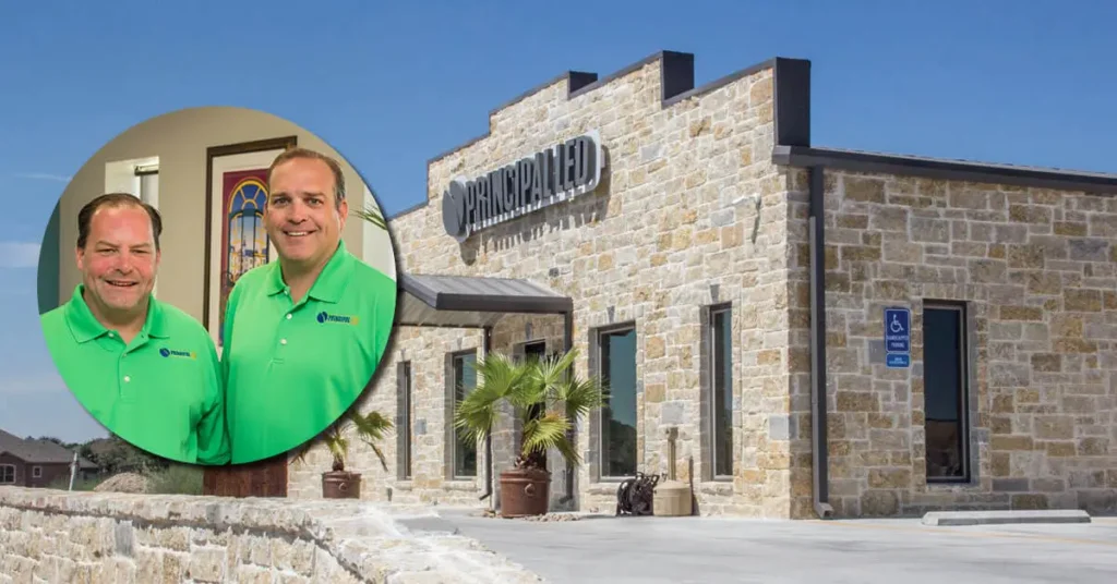 Bryan and Blake Vincent pictured beside the company’s corporate facility.