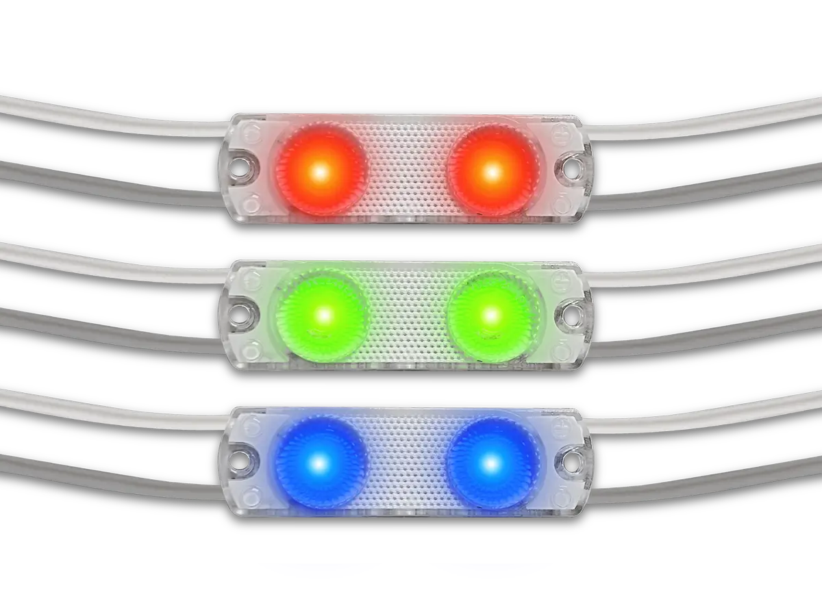 Qwik Mod™ 24V Gen 2 Mod 2 Colors two-lens LED modules illuminated in red, green, and blue.