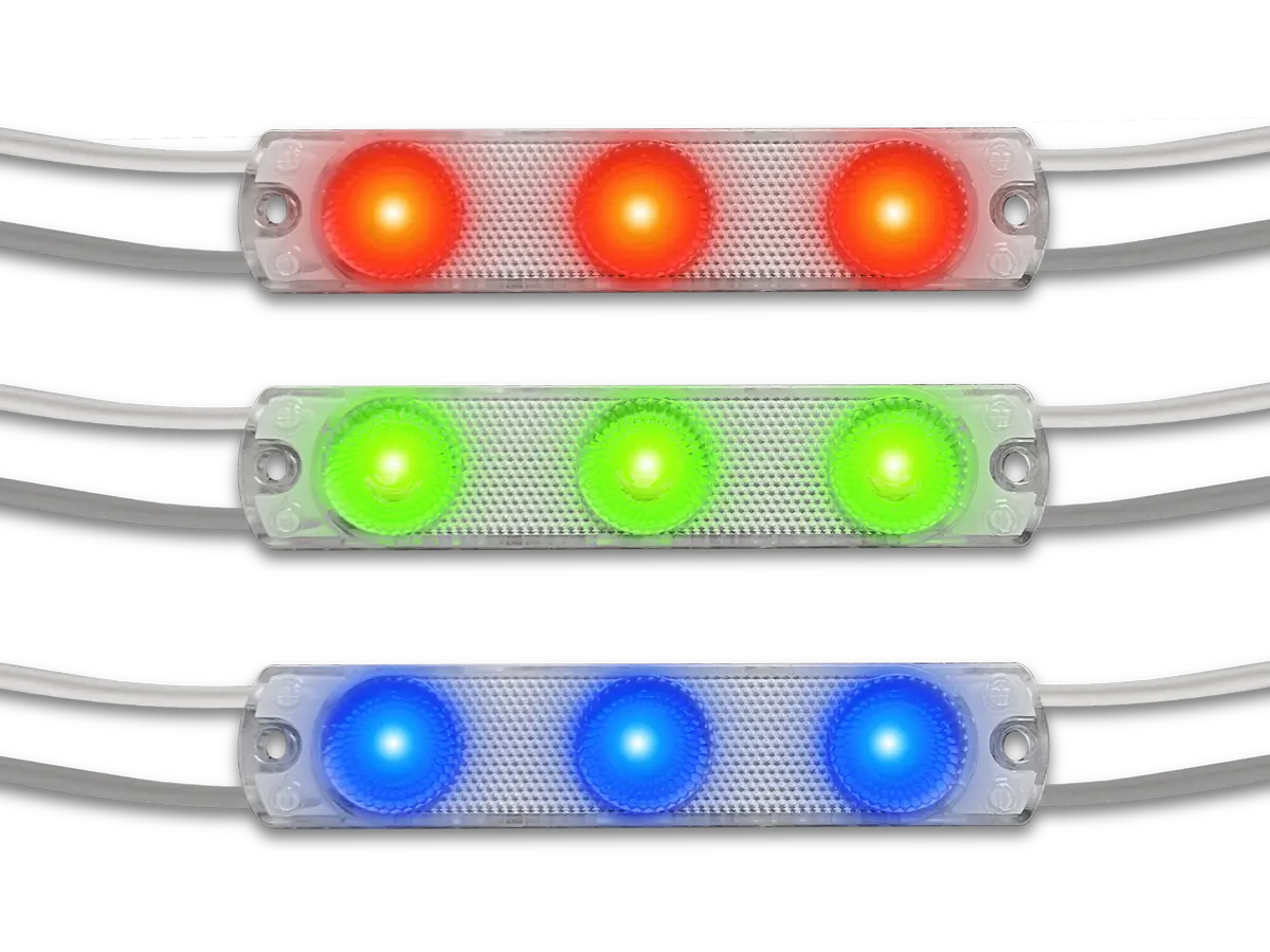 Qwik Mod™ 24V Gen 2 Mod 3 Colors three-lens LED modules illuminated in red, green, and blue.